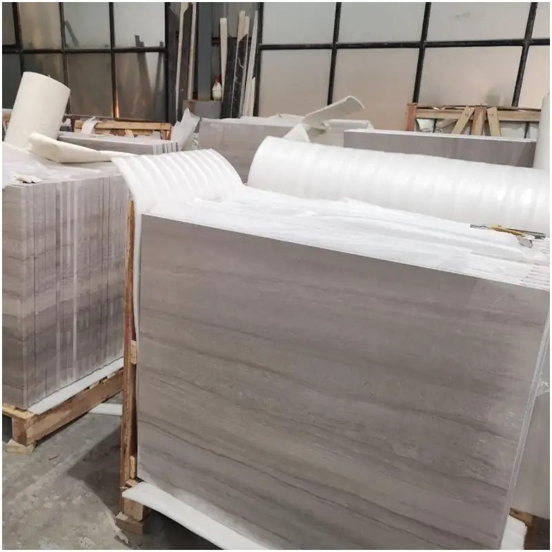 Wooden Grey Marble Thin Tiles With Bubble Wrap Protection Stacked On Pallets Chinese Marble Manufacturers Export Packing Stock