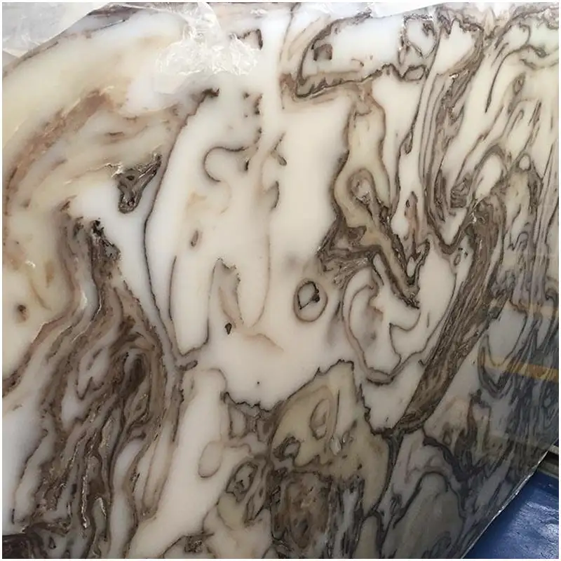 artificial-onyx-marble-surface-panel Artificial onyx marble slab surface with soft white base and natural stone look pattern