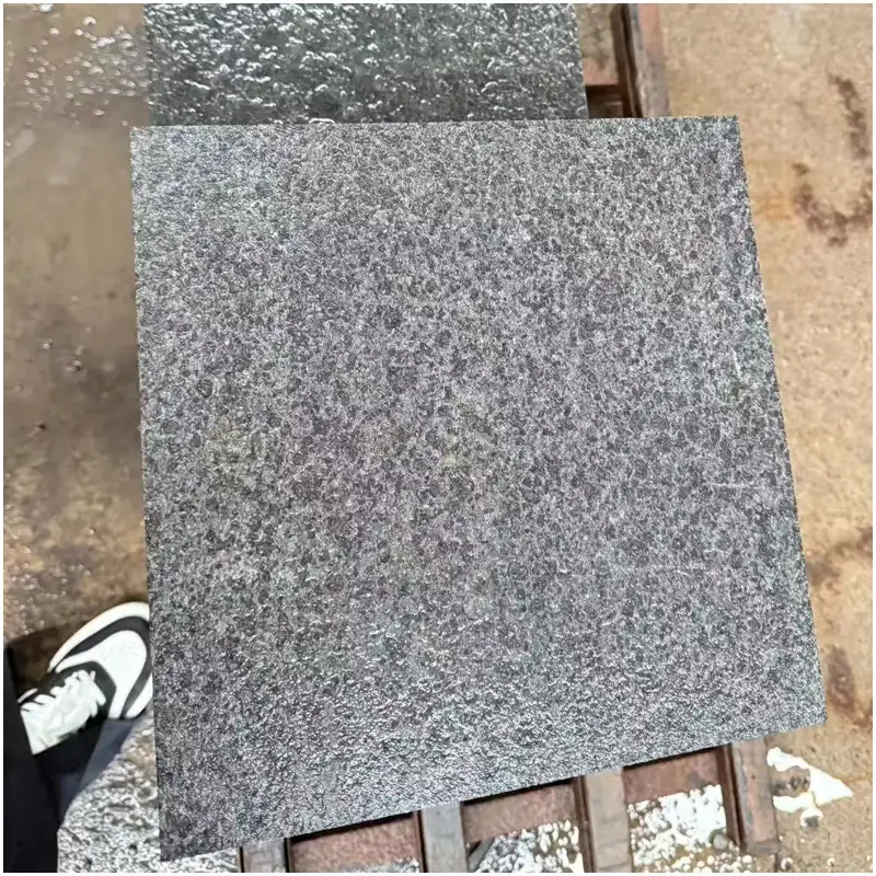 G654 Grey Granite flamed tiles stacked in factory for flooring and wall cladding projects