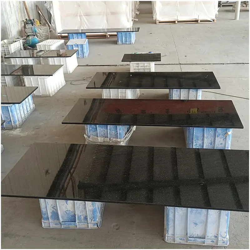 Polished black granite countertops with laminated edges for kitchen and vanity projects