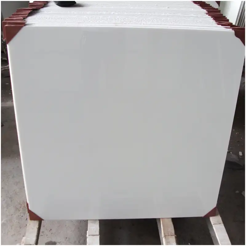 pure-white-nanoglass-tiles Pure White Nanoglass tiles stacked in factory with smooth polished white surface